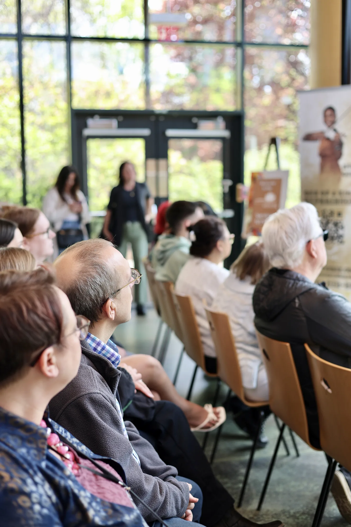 Guests seated during a presentation at the Reclaim 13 event