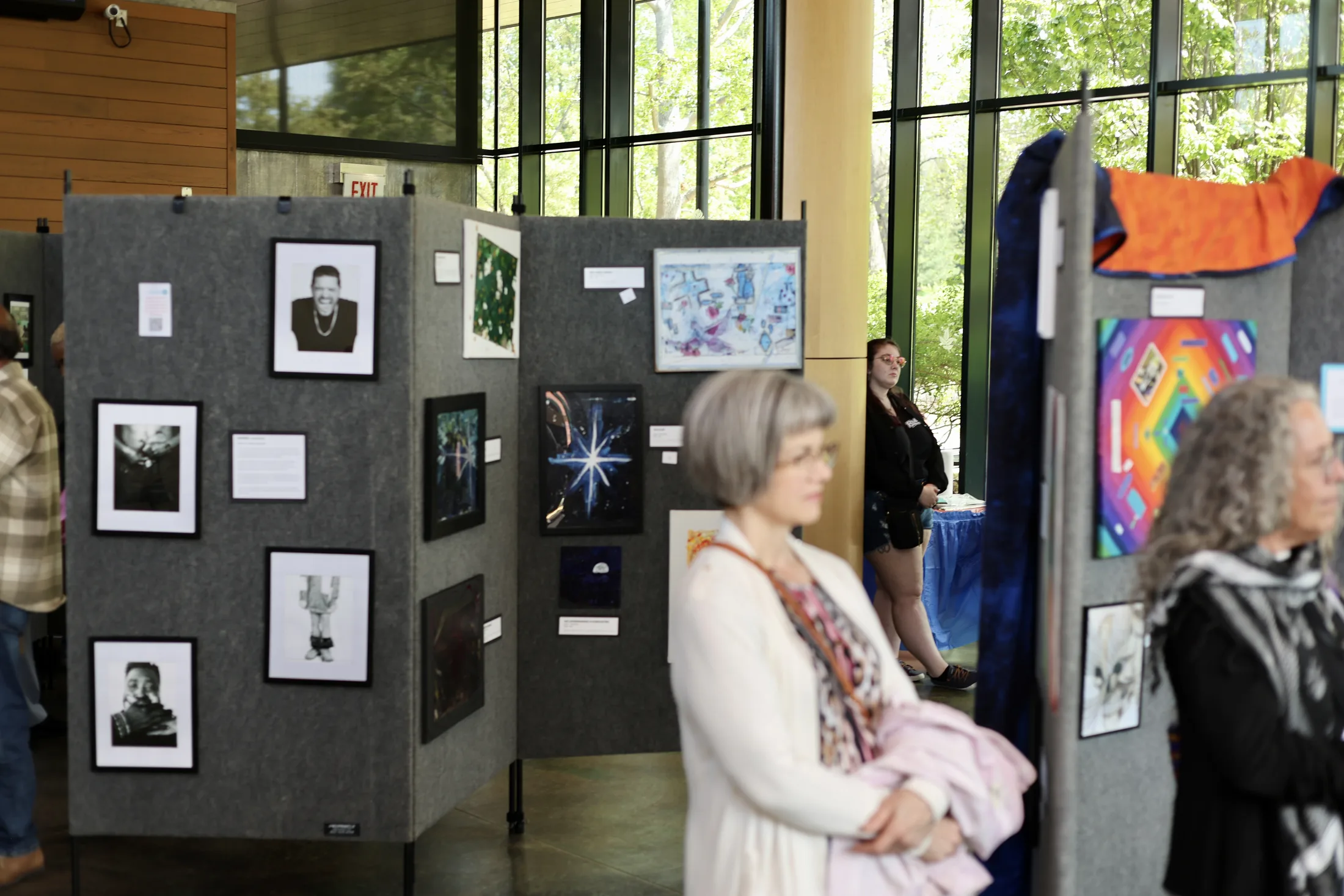Artwork displays and guests inside the Reclaim 13 event venue